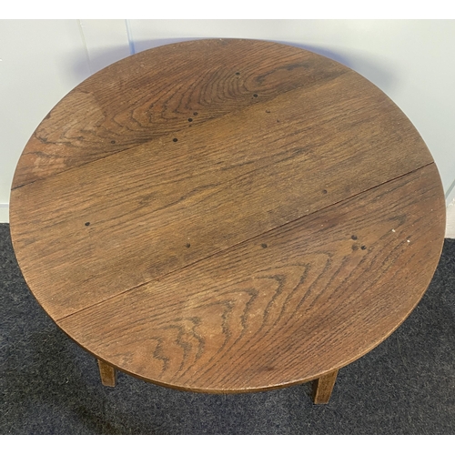 900 - An oak cricket table with circular plank top on three legged base 74.5cm diameter, 75cm high... 