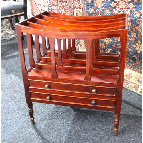 906 - A mahogany Canterbury, 20th century, having open storage above two drawers, raised on turned support... 