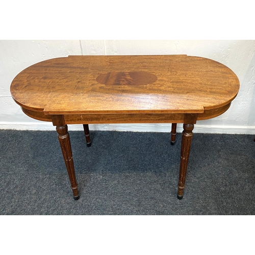 907 - A Georgian style inlaid mahogany coffee table, 20th century, the shaped top raised on four fluted ta... 