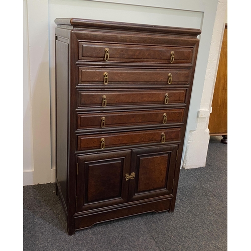 923 - A Chinese hardwood collector's chest with five baize lined drawers above two panel doors, on shaped ... 