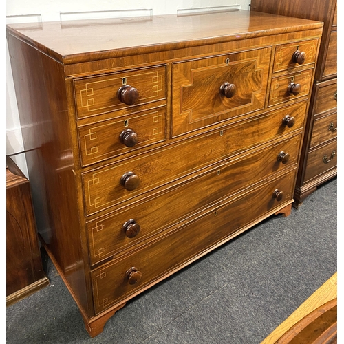 924 - A 19th century Scottish mahogany inlaid chest of seven drawers including a central deep hat drawer, ... 