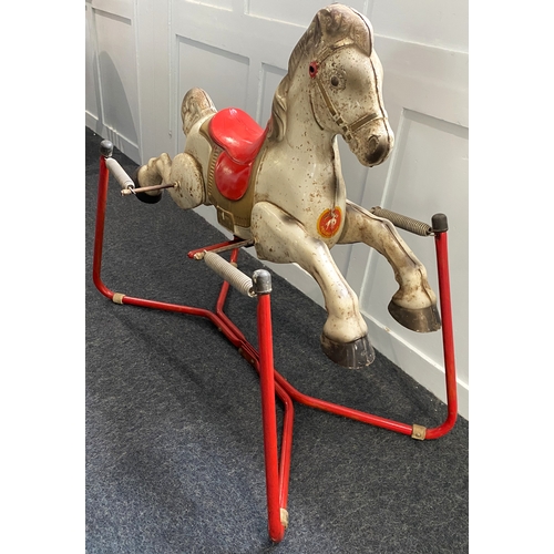 241 - A Mobo 'Praire King' spring rocking horse, mid 20th century, bearing makers label to front, on stand... 