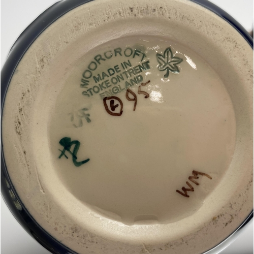 47 - A Moorcroft pottery Mackintosh pattern slender jug / ewer, 24cm high... 