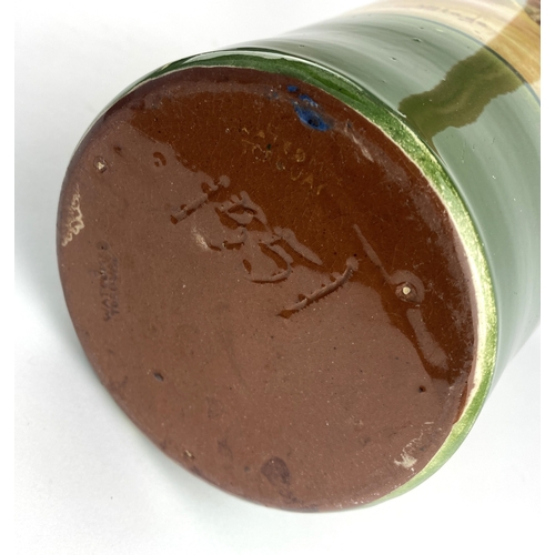 13 - A Torquay pottery vase decorated with a scenic view of Cockington Village 36cm high... 