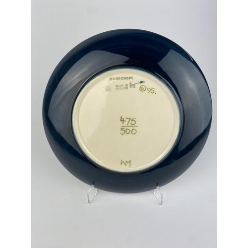 16 - A Moorcroft pottery 'Morning Glory' pattern limited edition plate, numbered 475/500, 21.5cm diameter... 