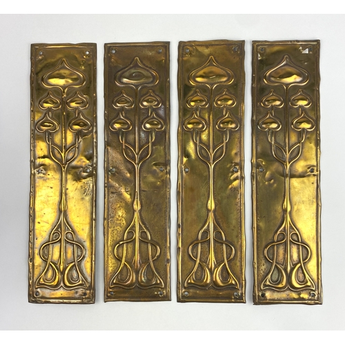 25 - A set of four Art Nouveau brass finger plates, each with embossed stylised floral motif, 26.75cm x 7... 