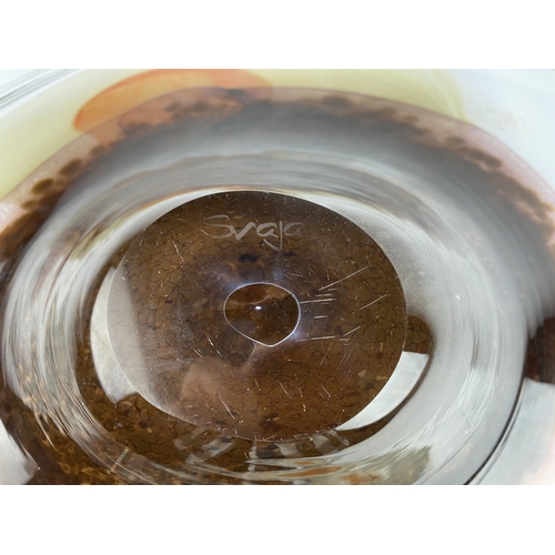 29 - A large Svaja art glass bowl, clear glass, with the centre in burgundy, orange and opalescent, signa... 
