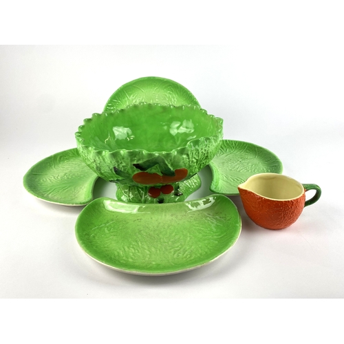 35 - A Carlton ware ceramic salad bowl, four kidney shaped salad plates and a small orange jug (a/f)... 