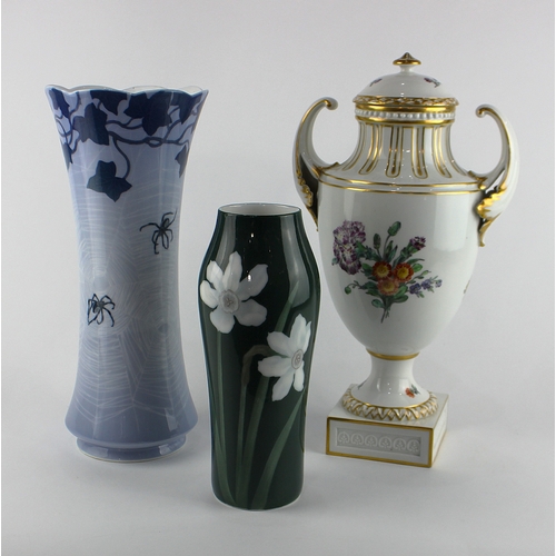 37 - Three Royal Copenhagen porcelain vases, the twin hadled urn form vase with cover, 35cm high, the spi... 