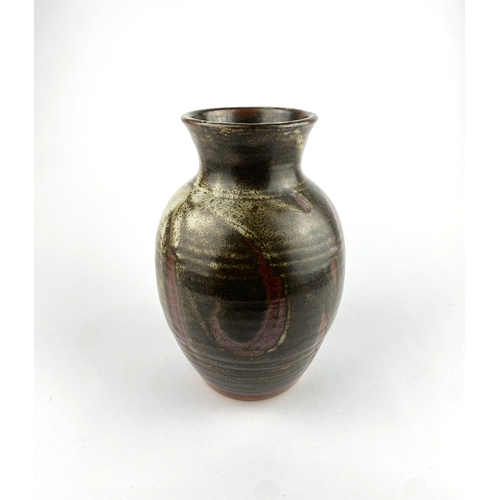 4 - A Winchcombe Pottery studio pottery vase, decorated with tenmoku abstract forms on mottled ribbed gr... 
