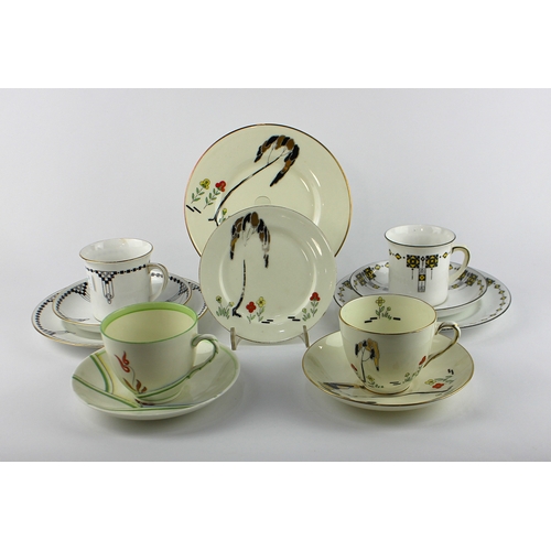 49 - A Foley China Secessionist design cup, saucer and side plate trio, another similar trio, a Royal Dou... 