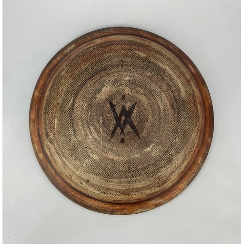 5 - A studio pottery dish, late 20th century, stoneware, with brown and teal coloured glaze, raised geom... 