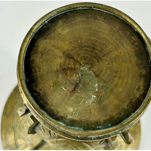 104 - A Chinese bronze Gu vase, with incised decoration depicting a deer, birds, and naturalistic designs,... 