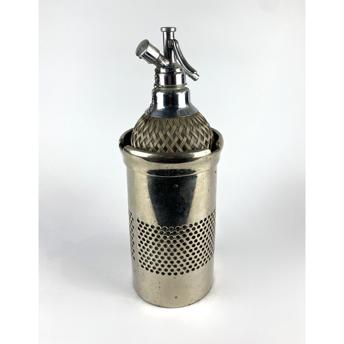 134 - A vintage Sparklets wire-mesh-bound glass soda syphon 37cm high