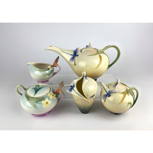 14 - A collection of Franz porcelain comprising a 'Dragonfly' teapot, sugar bowl and cover, and vase, and... 