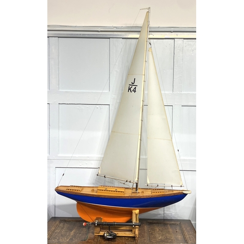 148 - A large painted wood model pond yacht with motor (a/f untested, remote control lacking) 169cm high, ... 