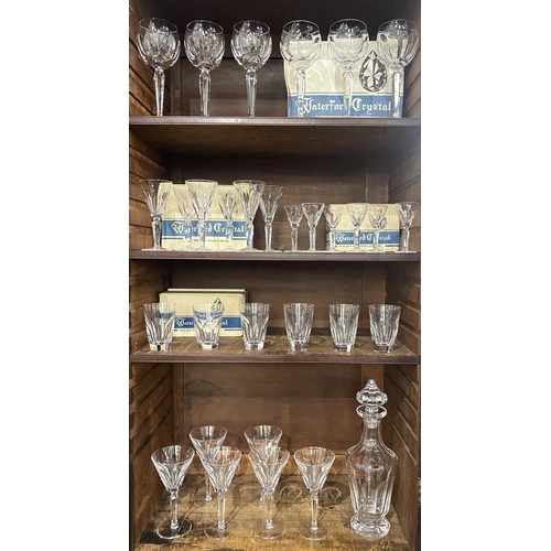 15 - A Waterford crystal 'Sheila' pattern part suite of drinking glasses comprising decanter, six boxed h... 