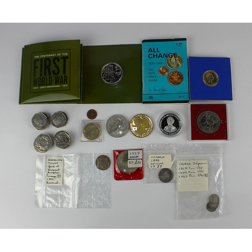 152 - Coins: A collection of British coins, including; two Elizabeth II 2014 First World War centenary £5 ... 