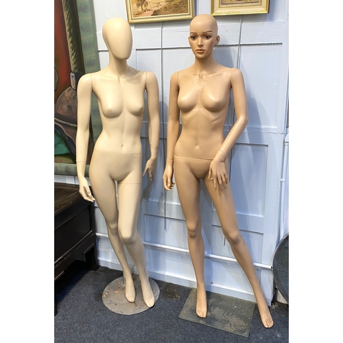 158 - Two full length life size female mannequins, on stands, each approx 6' high.