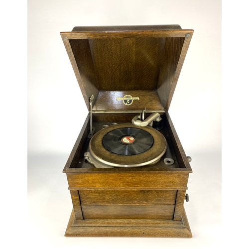 161 - A Columbia oak cased portable gramaphone, c.1930's, 44cm wide by 38cm high.