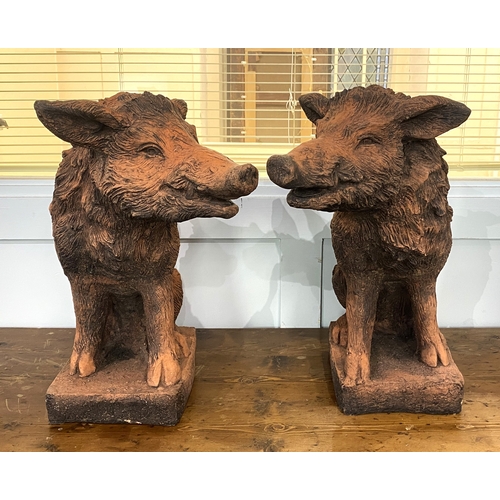 162 - A pair of wild boar garden statues / gate post finials, constructed in frost proof terracotta colour... 