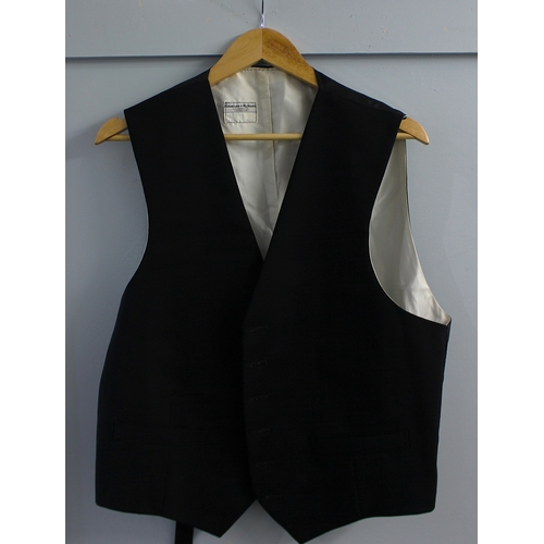 170 - Benny Hill / The Benny Hill Show (1969 - 1989): A black waistcoat, of wool, with a white silk effect... 