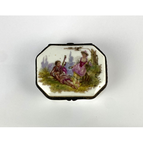 21 - A 19th century continental porcelain trinket box, of canted rectangular form, decorated against the ... 