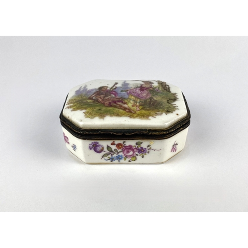 21 - A 19th century continental porcelain trinket box, of canted rectangular form, decorated against the ... 
