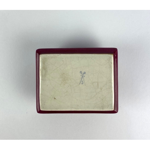 21 - A 19th century continental porcelain trinket box, of canted rectangular form, decorated against the ... 