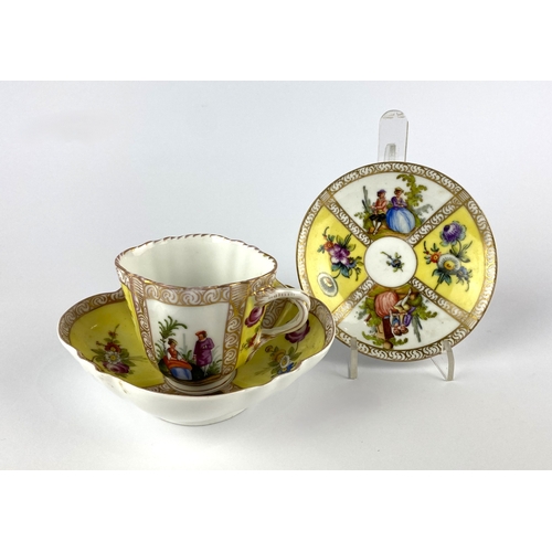 27 - A Dresden/ Helena Wolfsohn type porcelain cabinet cup and saucer, each decorated with panels of cour... 