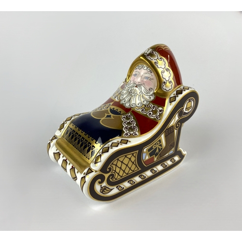 28 - A Royal Crown Derby 'Santa & Sleigh' paperweight, decorated in typical Imari colours, with gold ... 