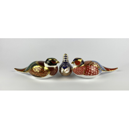 32 - A Royal Crown Derby 'Woodland Pheasant' paperweight, decorated in typical Imari colours, signed 'Lou... 