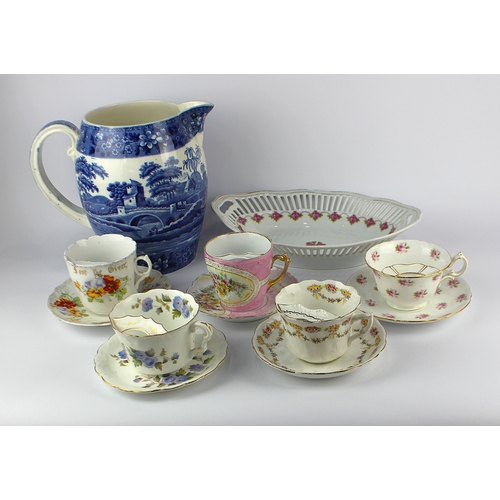 35 - A Foley China moustache cup and saucer, decorated against the white ground with pink rose sprays, to... 