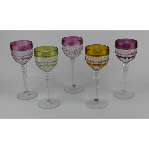 36 - A harlequin set of five cut glass hock glasses, clear glass with varying coloured glass upper, heigh... 