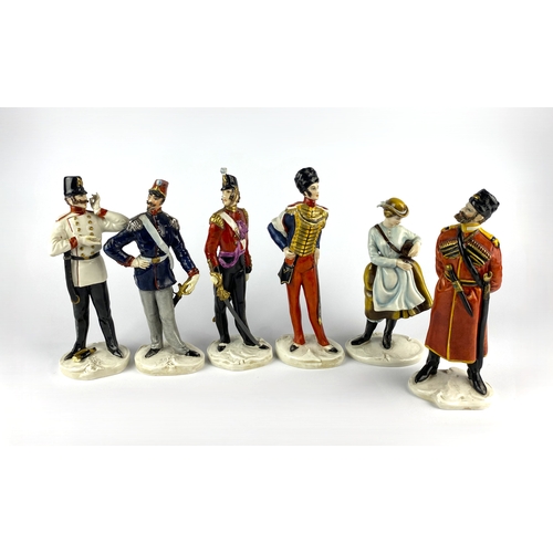 39 - A collection of six Cacciapuoti Italian porcelain military figures, including female figure with bar... 