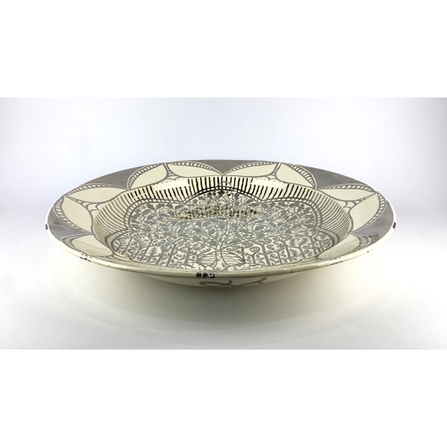 4 - A large Art Pottery silver lustre wall charger by Louise Powell (British, 1865-1956) for Wedgwood, p... 