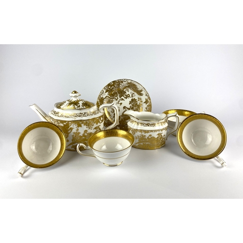 42 - A Royal Crown Derby 'Gold Aves' pattern teapot and milk jug, numbered A.1235, each gilt decorated wi... 