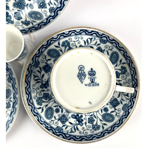 43 - A Royal Crown Derby 'Wilmot' pattern part tea service, comprising; three tea cups and saucers (one l... 