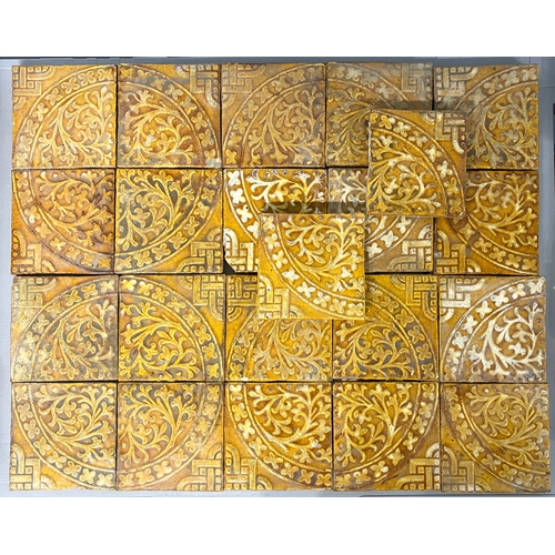 47 - Twenty-two Craven Dunnill & Co glazed yellow tiles with repeating design of buds in a circle for... 