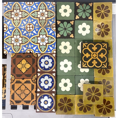 48 - A collection of twenty-nine assorted tiles with floral deisgns to include eight Maw & Co Brosele... 