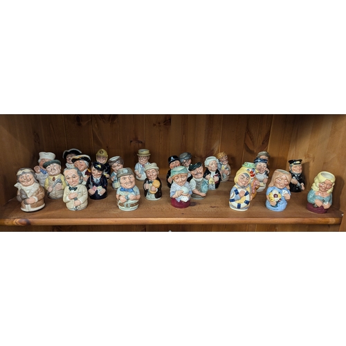 5 - A collection of twenty-five assorted Royal Doulton 'Doultonville' character jugs comprising Albert S... 