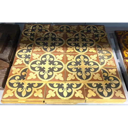 54 - Thirty-one Victorian English Gothic Revival style encaustic tiles with fleur de lis 'cross fleury' w... 