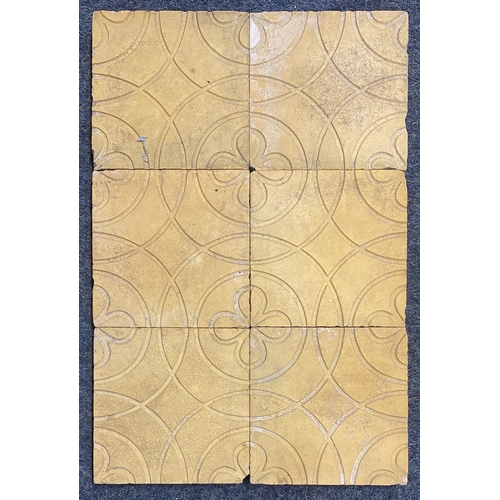 56 - Thirty-five buff coloured tiles with inset grooved design of flowers within circles, 13cm by 13cm... 