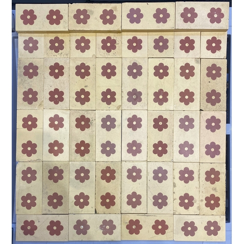 59 - Forty floral border tiles with repeating terracotta flower pattern on buff coloured ground, no maker... 