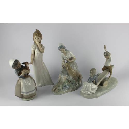 76 - A Lladro porcelain figure group 'A Child's Prayer', 06496, together with a Nao figure of a seated an... 