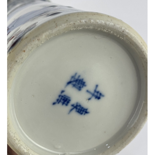 112 - A 19th century Chinese blue, white and brown porcelain sleeve vase, painted with warriors and attend... 