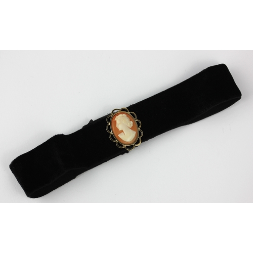 342 - A 9ct gold mounted oval shell cameo ribbon slide carved as the portrait of a lady within a pierced s... 