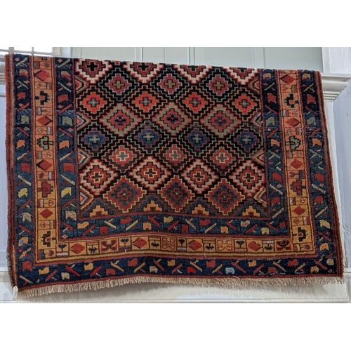 897 - A Kilim rug, with typical multi-coloured geometric design within multiple borders, approx 290cm by 1... 