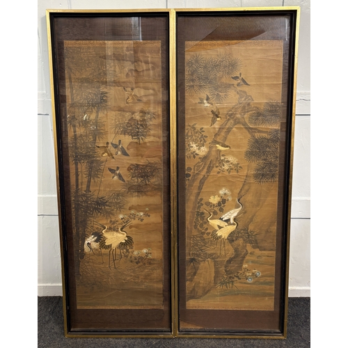 103 - Japanese School - a pair of large silkwork and watercolour panels depicting birds in landscapes, fra... 
