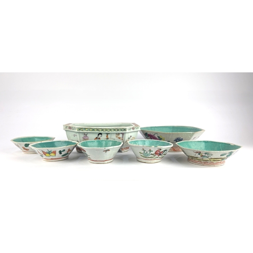 109 - A Chinese porcelain planter, decorated with panels of figures within an interior, of octagonal form,... 